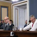 House Rules Committee Chairman Pete Sessions, R-Texas, right, listens to objections by Rep. James P. McGovern, D-Mass., the top Democrat on the panel, as the Rules Committee makes revisions to the government funding bill to include $5 billion for President Donald Trumps wall along the U.S.-Mexico border at the Capitol in Washington on Thursday. (J. Scott Applewhite/The Associated Press)
