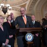 Senate Minority Leader Chuck Schumer, D-N.Y., talks to reporters about the possibility of a partial government shutdown at the Capitol in Washington. Surrounding him, from left, are Sen. Patty Murray, D-Wash., Sen. Debbie Stabenow, D-Mich., and Sen. Dick Durbin, D-Ill., the assistant Democratic leader. (J. Scott Applewhite/The Associated Press)