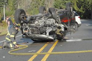 Forks woman shaken but uninjured after pickup flips on Highway 101