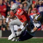 Ohio State quarterback Dwayne Haskins gets sacked by Washington linebacker Ryan Bowman during the first half of the Rose Bowl NCAA college football game Tuesday, Jan. 1, 2019, in Pasadena, Calif. (AP Photo/Mark J. Terrill)