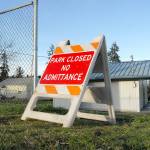 A sign barring admittance to Port Angeles Lions Park stands at the south gate from Whidby Avenue. (Keith Thorpe/Peninsula Daily News)