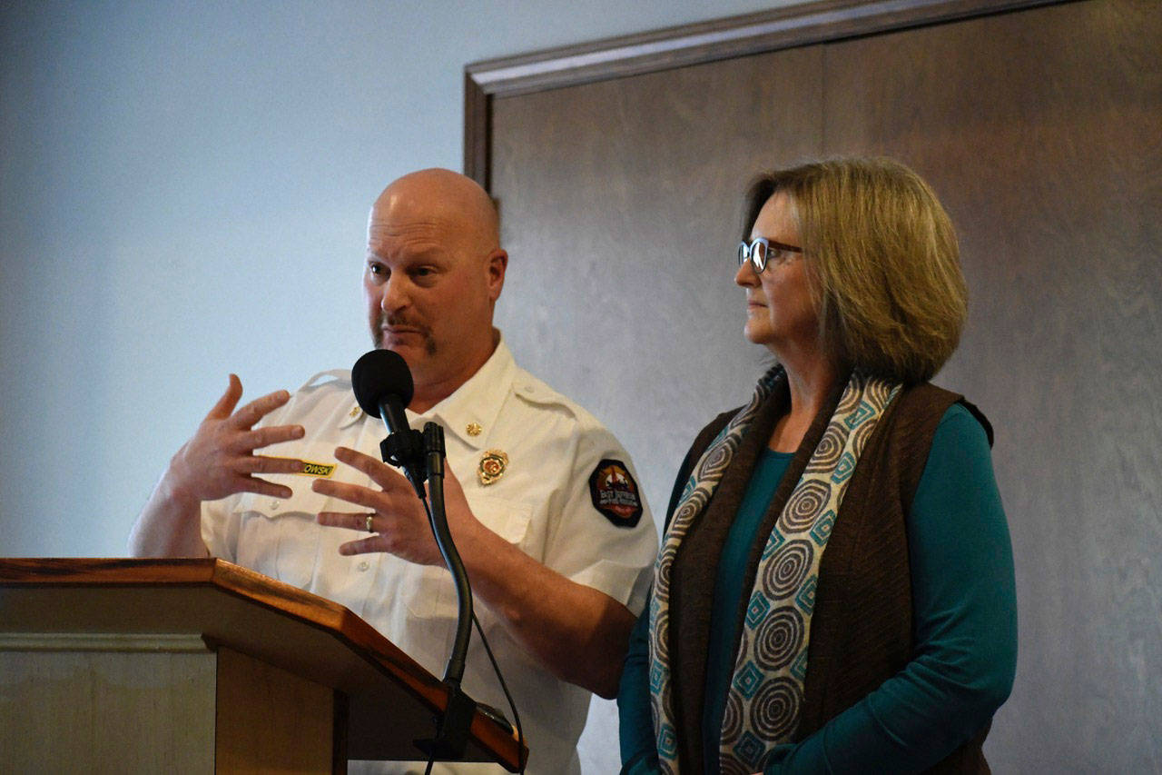 East Jefferson Fire-Rescue Chief Jim Walkowski and Port Townsend Mayor Deborah Stinson present details about the citys proposed annexation that will be on the Feb. 12 ballot to the Jefferson County Chamber of Commerce on Monday. (Jeannie McMacken/Peninsula Daily News)