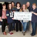 PHOTO: Food, funds donation banked in Port Angeles