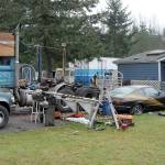 The Bear Meadow Road site of a triple homicide in late December sits idle Friday as authorities continue to investigate the incident east of Port Angeles. (Keith Thorpe/Peninsula Daily News)