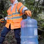 PHOTOS: Volunteers clean up homeless encampment in Port Angeles