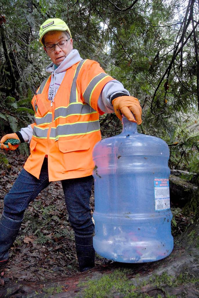 PHOTOS: Volunteers clean up homeless encampment in Port Angeles