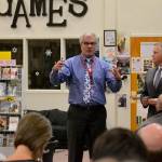 Sequim School Superintendent Gary Neal stands with Trevor Carlson, managing director of PiperJaffray, on Monday, during a forum for discussions on future construction needs and bond and levy options. (Matthew Nash/Olympic Peninsula News Group)