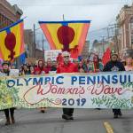 Police estimated that about 1,000 people participated in the third annual Olympic Peninsula Womxns Wave in Port Townsend on Sunday. (Jesse Major/Peninsula Daily News)
