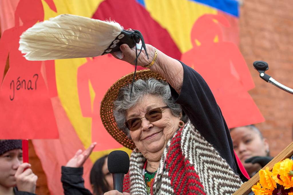 Elaine Grinnell of the Jamestown SKlallam Tribe blesses the crowd at the third annual Olympic Peninsula Womxns Wave in Port Townsend on Sunday. (Jesse Major/Peninsula Daily News)