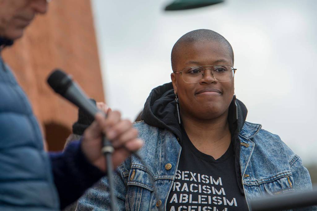 Shewa Dedeke of Port Angeles was one of several speakers during the third annual Olympic Peninsula Womxns Wave in Port Townsend on Sunday. (Jesse Major/Peninsula Daily News)