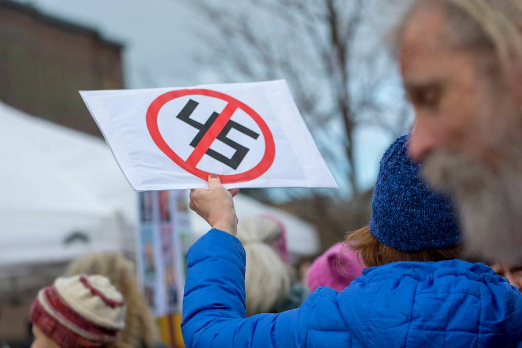 Police estimated that close to 1,000 people attended the third annual Olympic Peninsula Womxns Wave in Port Townsend on Sunday. (Jesse Major/Peninsula Daily News)