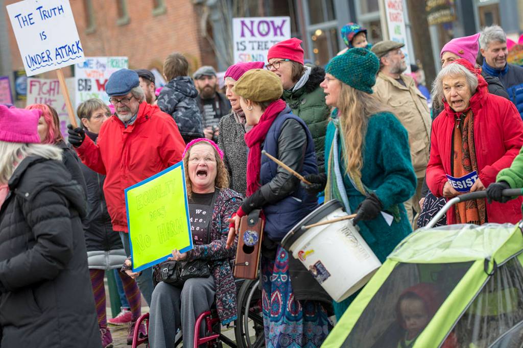 Police estimated that close to 1,000 people attended the third annual Olympic Peninsula Womxns Wave in Port Townsend on Sunday. (Jesse Major/Peninsula Daily News)