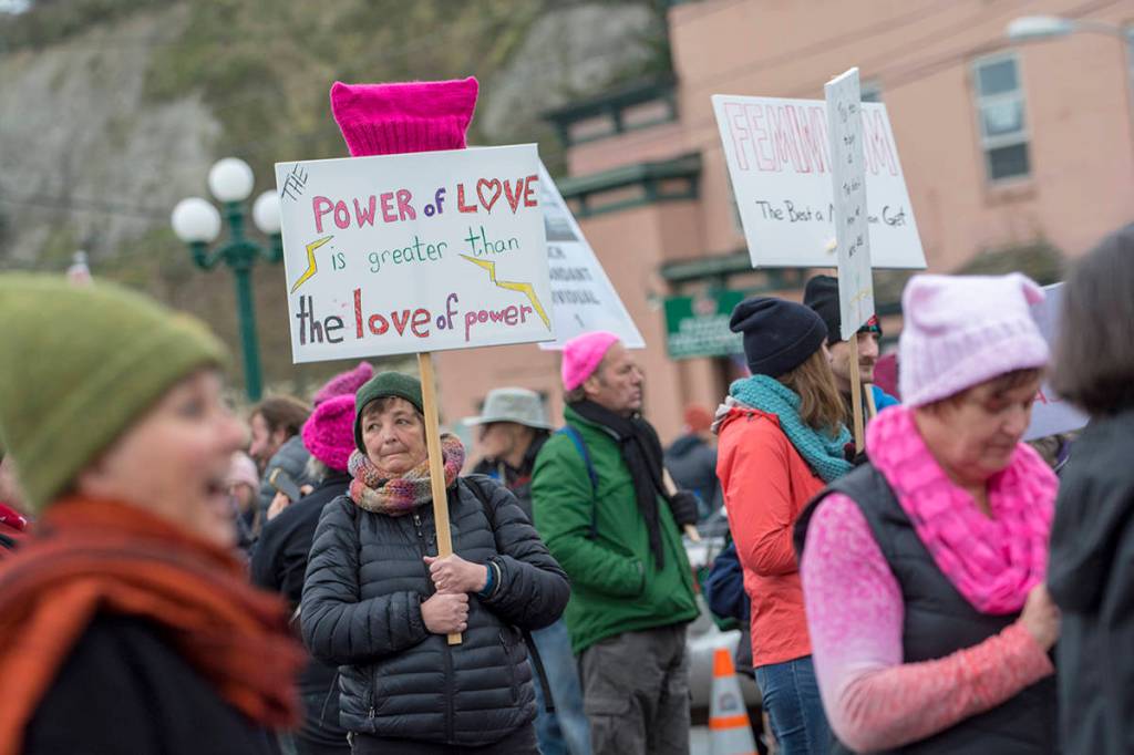Police estimated that close to 1,000 people attended the third annual Olympic Peninsula Womxns Wave in Port Townsend on Sunday. (Jesse Major/Peninsula Daily News)