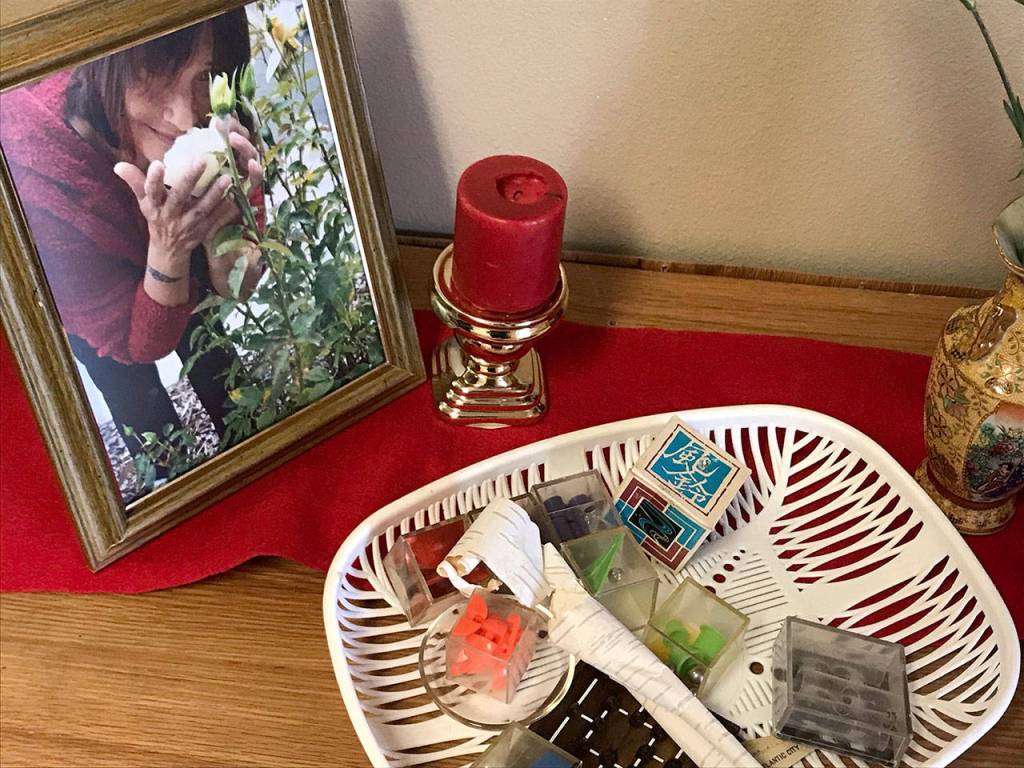 Photos of Valerie Claplanhoo and other personal items were displayed Sunday at a remembrance service at Sunbelt Apartments in Sequim, where she lived. (Paul Gottlieb/Peninsula Daily News)