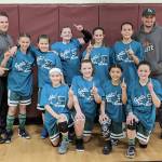 PA Elite won the 5th grade girls basketball championship over the weekend at the annual Port Angeles Parks and Recreation Martin Luther King Jr. Tournament. Team members and coaches are, back row from left, Coach Dustin Clark, Kennedy Ronglein, Lindsay Smith, Leah Flanagan, Becca Manson, Clare Bowechop, Coach Ryan Smith and front, Teanna Clark, Shyanne Hunter, Qwaapeys Greene and Brooklyn Johnson.
