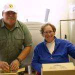 Buddy and Meg DePew work in their garage finalizing orders last year, and plan to expand this year with new equipment, a kitchen and website while seeking contracts with bigger grocers in Western Washington. (Sequim Bee Farm)