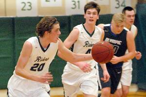 BOYS BASKETBALL: Port Angeles flips the switch after halftime in win over Olympic