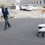 <strong>Rachel La Corte</strong>/The Associated Press                                State Rep. Steve Tharinger, D-24th District, walks by a delivery device during a demonstration outside the state Capitol in Olympia on Monday.