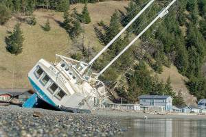 Captain eyes repairs needed to make boat beached at Beckett Point seaworthy
