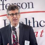 Jefferson Healthcare CEO Mike Glenn welcomes business and community leaders to the fourth annual Health Hearts luncheon in Port Townsend on Friday. (Jesse Major/Peninsula Daily News)