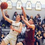 BOYS BASKETBALL: Forks’ Seth Johnson vital to Spartans’ postseason chances