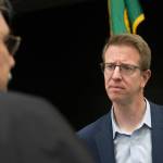 U.S. Rep. Derek Kilmer talks with people after a town hall in Quilcene. (Jesse Major/Peninsula Daily News)