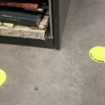 Dots mark areas where piping has leaked in the past. According to state Secretary of State Kim Wyman, the markers are to show where to put the buckets if leakages occur again. (Emma Scher/WNPA Olympia News Bureau)