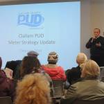 PUD General Manager Doug Nass, right, speaks before a packed commissioners room last Monday. (Michael Dashiell/Olympic Peninsula News Group)
