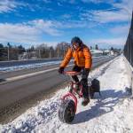 Steve Breitbach rides an Extreme Terrain bike on Eighth Street in Port Angeles on Sunday. (Jesse Major/Peninsula Daily News)