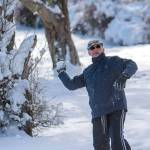 Steve Veltkamp takes aim during a community snowball fight in Port Angeles on Sunday. (Jesse Major/Peninsula Daily News)