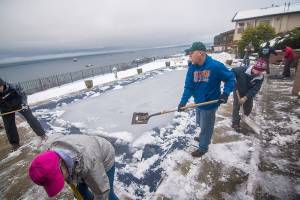 Friends remove snow for recovering coach in Port Angeles
