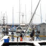The 50-foot sailboat Fram rests on the bottom of Port Angeles Boat Haven on Wednesday morning after sinking the previous night. (Keith Thorpe/Peninsula Daily News)