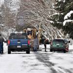 Wednesday, Spokane County Sheriffs deputies respond to a call where a Spokane County plow driver said a local man brandished a firearm and told him to step out of his plow in Spokane. (Tyler Tjomsland/The Spokesman-Review via The Associated Press)