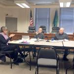 Port Townsend City Council member Michelle Sandoval, left, Jefferson County Administrator Philip Morley, center, and Jefferson County Commissioner David Sullivan, right, discuss housing issues in the first meeting of the Joint Oversight Board on Affordable Housing and Homeless Housing on Wednesday. Sandoval and Sullivan are serving on the board, which will eventually be expanded to five members. (Rob Ollikainen/Peninsula Daily News)