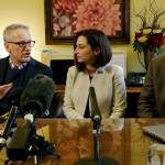 Department of Health Secretary John Wiesman, left, talks to the media about the recent measles outbreak as Dr. Robyn Rogers, center, and Dr. Gary Goldbaum of the Washington State Medical Association look on, Wednesday in Olympia. (Rachel La Corte/The Associated Press)