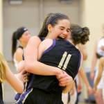 Michael Dashiell/Olympic Peninsula News Group Sequims Hope Glasser, left, and Abby Schroeder celebrate the Wolves come-from-behind 54-44 victory over Foster to advance to the Class 2A State Tournament.