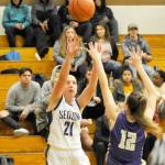 Michael Dashiell/Olympic Peninsula News Group Sequims Kalli Wiker, left, is shooting 42 percent on 3-point shots for the Wolves this season.