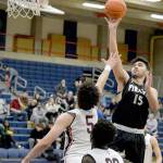 Rick Ross Samuel Kahapea shoots against Bellevue College. Kahapea scored 18 points to help the Pirates come from behind to beat Bellevue 69-68, qualifying for the NWAC Tournament.