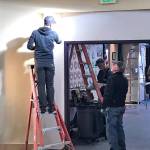 A Port Angeles School District maintenance crew works on installing controlled access to a school entry. From left are Josh Winters on the ladder and Ron Erdmann in front with Bob Anderson in back. (Nolan Duce/Port Angeles School District)