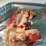 Now done, a grilled lobster tail awaits its fate. (Emily Hanson/Peninsula Daily News)