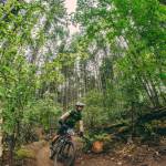 Powell Jones carves his way through a corner on the first day of the BC Bike Race. Photo courtesy of Powell Jones