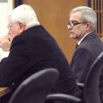 Former Clallam County Corrections Deputy Howard Blair, right, sits with attorney Larry Freedman during Blairs sentencing Wednesday. (Keith Thorpe/Peninsula Daily News)
