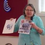 Animation and watercolor artist Carolyn Guske demonstrates her work at a recent Olympic Peninsula Arts Association monthly meeting. (Erin Hawkins/Olympic Peninsula News Group)