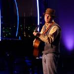 Photo courtesy of AMERICAN IDOL - Coverage. (ABC/Kelsey McNeal)                                Kalan Wolfe, a 2008 Sequim graduate, performs on American Idol before judges leading him to advance to Hollywood Week. The show airs in Western Washington at 8 p.m. Sundays and Mondays on KOMO-4.
