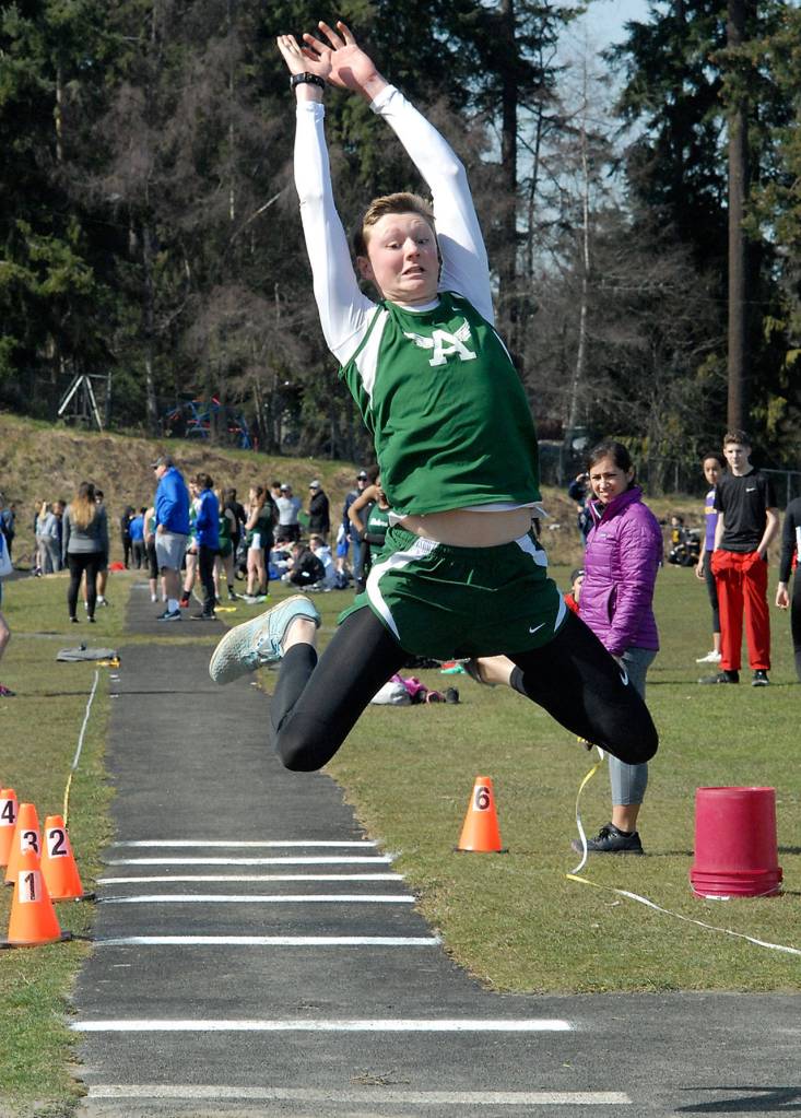 Keith Thorpe/Peninsula Daily News Adam Kennedy of Port Angeles compets in the triple jump during Saturdays Port Angeles Invitational track meet at Port Angeles High School.