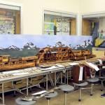 Sabrina Bees of Forks checks out a wooden train and trestle donated by the Olympic Corrections Center. The center again was a large contributor to the fundraising auction, as it has been in the past. (Lonnie Archibald/for Peninsula Daily News)