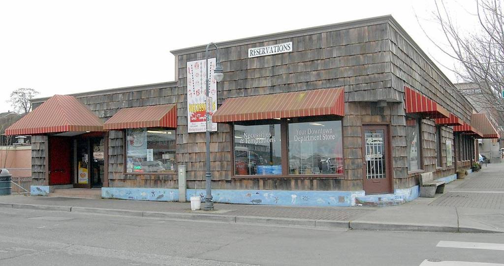 Necessities and Temptations, 217 N. Laurel St. in downtown Port Angeles, is one of two parcels being purchased by the Lower Elwha Klallam Tribe that adjoin the site of a future hotel proposed by the tribe. (Keith Thorpe/Peninsula Daily News)