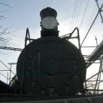 Scaffolding partially surrounds the Rayonier locomotive on Lauridsen Boulevard in Port Angeles on Tuesday. (Keith Thorpe/Peninsula Daily News)