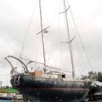 The sailboat Fram sits in a boat storage area on Friday at Port Angeles Boat Haven. (Keith Thorpe/Peninsula Daily News)