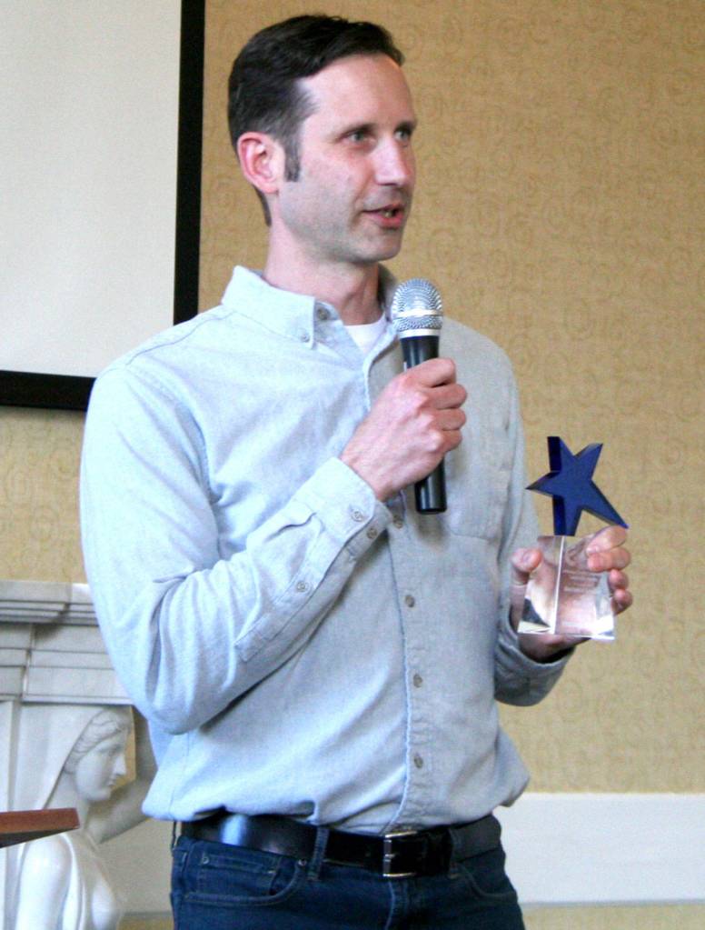Hans Frederickson, owner of Frederickson Electric, bought the business from his father, Erik, in 2012. He was named the 2018 Business Leader of the Year on Sunday during the Chamber of Jefferson County luncheon at the Old Alcohol Plant in Port Hadlock. (Brian McLean/Peninsula Daily News)